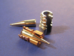 Reusable hub fitting for nozzles